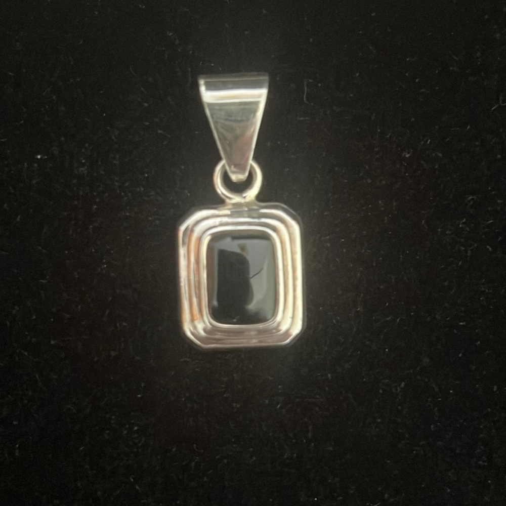 Silpada Retired sterling silver and black stone pendant.